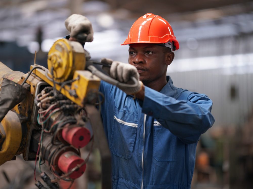 Factory Engineer Operating machines in industry factory. Factory Engineer Operating machines in industry factory.
