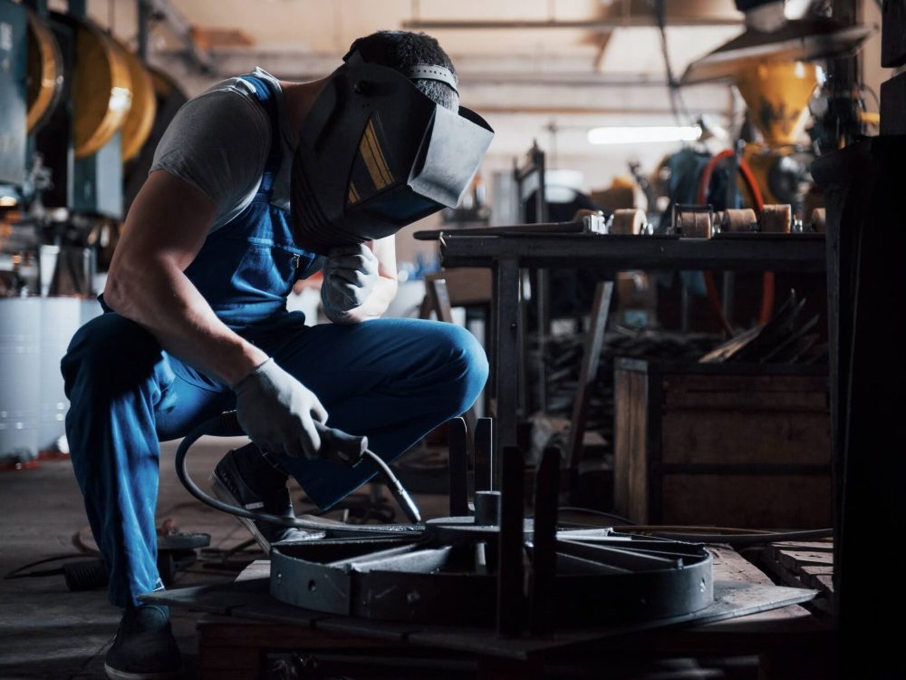 portrait-of-a-young-worker-at-a-large-metalworking-plant-the-welder-engineer-works-in-a-protective-1.jpg portrait-of-a-young-worker-at-a-large-metalworking-plant-the-welder-engineer-works-in-a-protective-1.jpg
